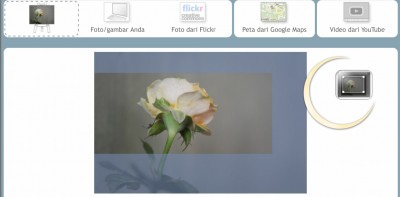 Foto yang diimpor kedalam blok halaman juga dapat di”krop”: klik tombol di sebelah kanan foto Anda.